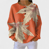 Eveli – naiste suure lehemotiiviga oranž pullover