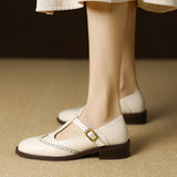 Janethe – brogue-detailidega T-rihmaga kingad madala kontsaga