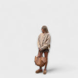 Liivia – ümara korpusega minimalistlik kandekott