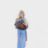 Liivia – ümara korpusega minimalistlik kandekott
