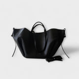 Liivia – ümara korpusega minimalistlik kandekott
