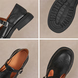 Kathe – brogue-mustriga T-rihmaga kingad ümara varbaga